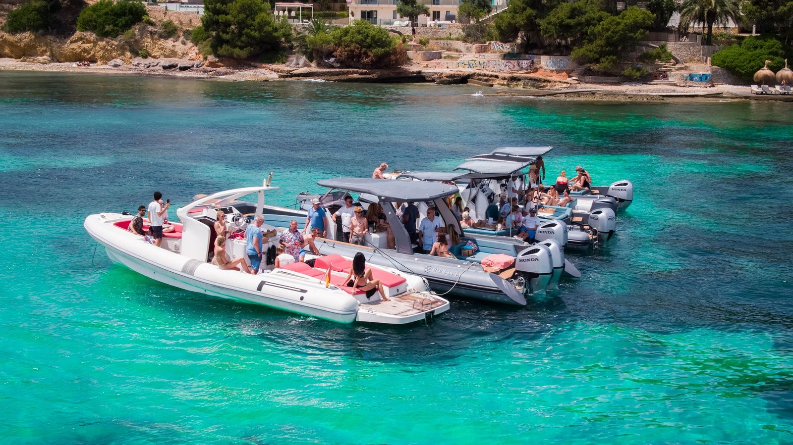 A couple of RIBs which have been rented by a family and are parked near the Club Nautico Santa Ponça.